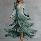 Clara · Vestido elegante con mangas de flecos