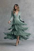 Clara · Vestido elegante con mangas de flecos