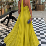 CARMEN | VESTIDO LARGO PLISADO AMARILLO CON CUELLO HALTER