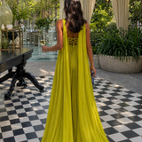 CARMEN | VESTIDO LARGO PLISADO AMARILLO CON CUELLO HALTER