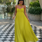 CARMEN | VESTIDO LARGO PLISADO AMARILLO CON CUELLO HALTER